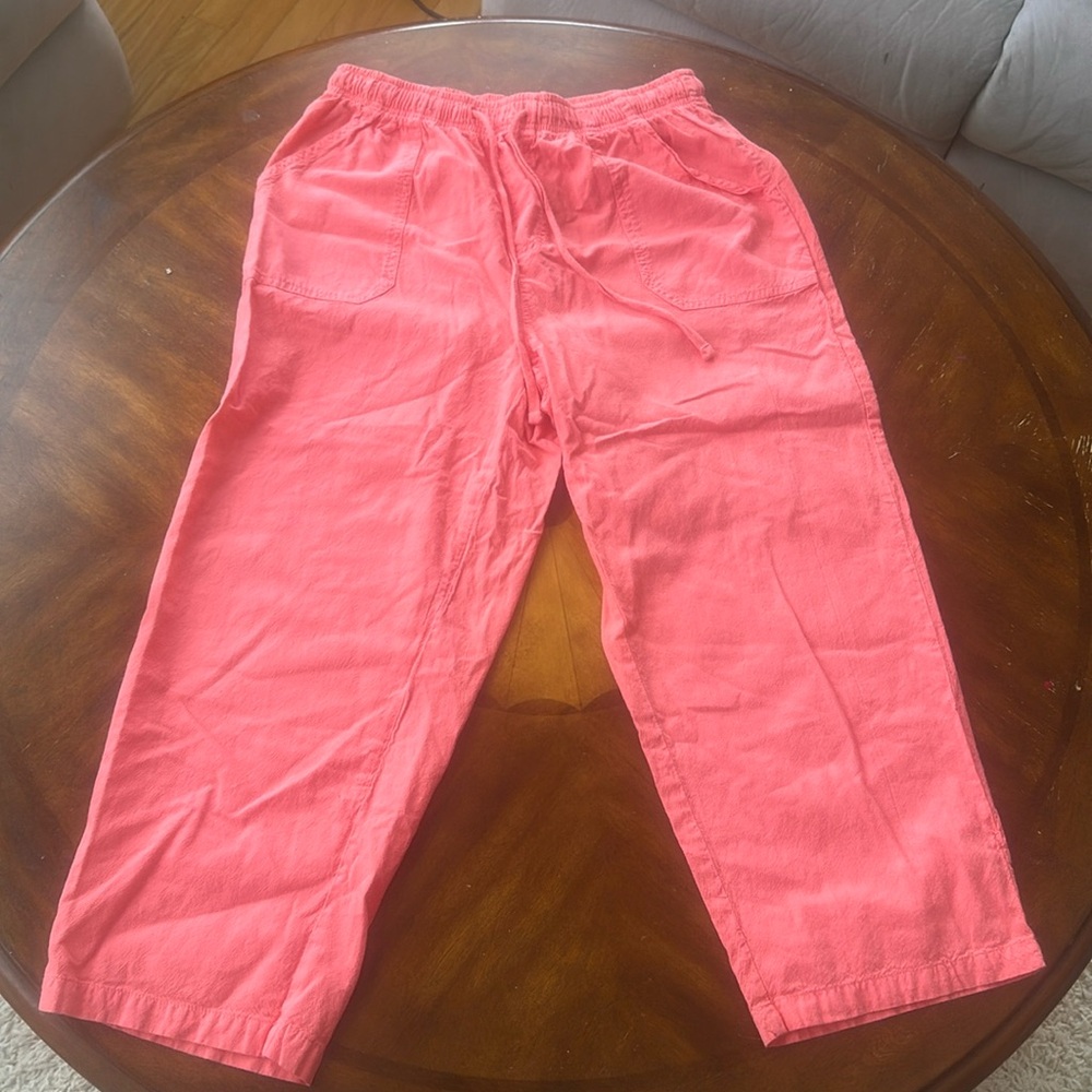 Selling pink, short legged pants for $26. Size small.